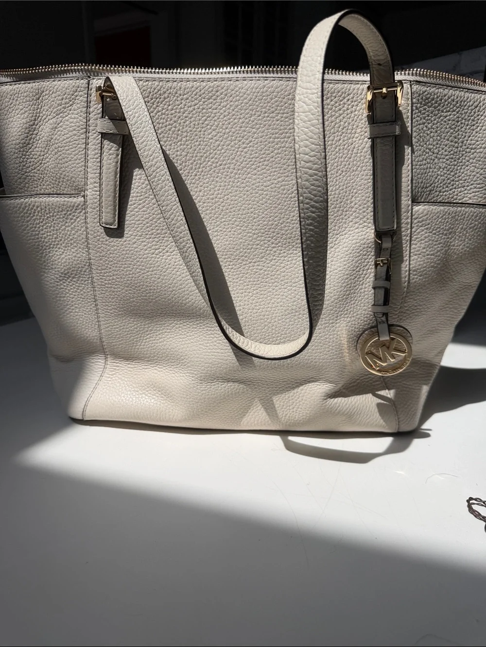 Michael Kors Cream Pebbled Leather Tote with Gold MK Charm